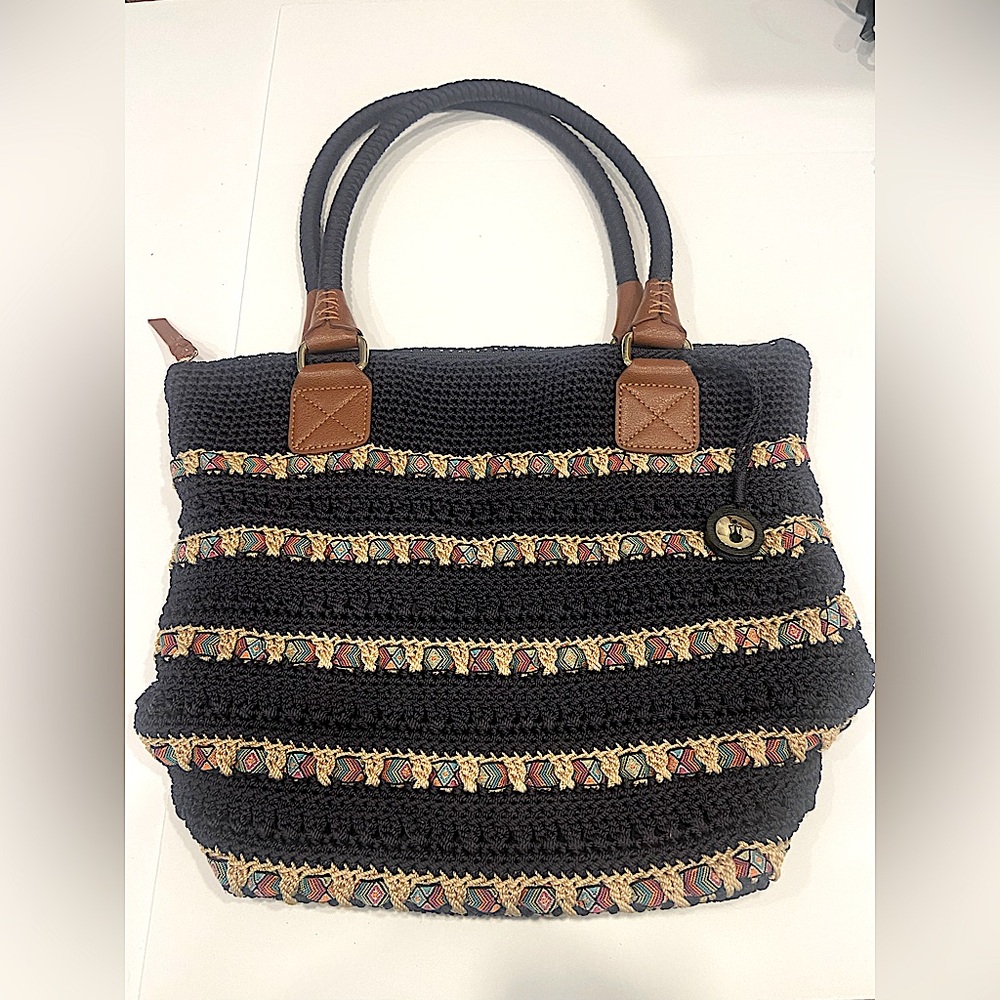 The Sak navy crochet purse with ribbon trim